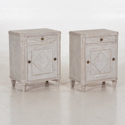 Pair of nightstands with drawers, 19th C.