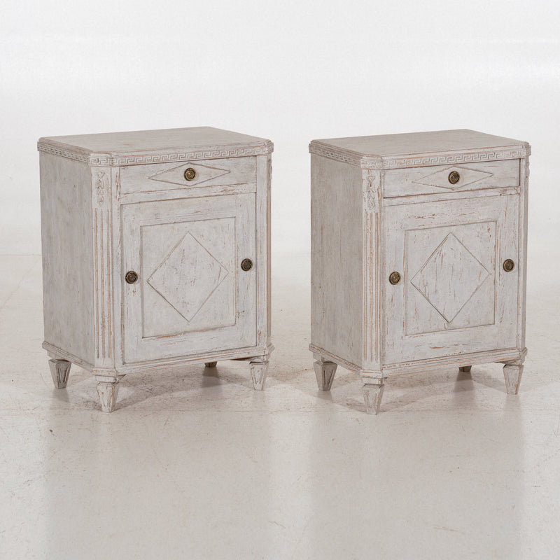 Pair of nightstands with drawers, 19th C.