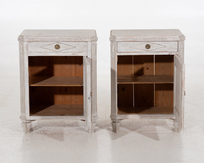 Pair of nightstands with drawers, 19th C.