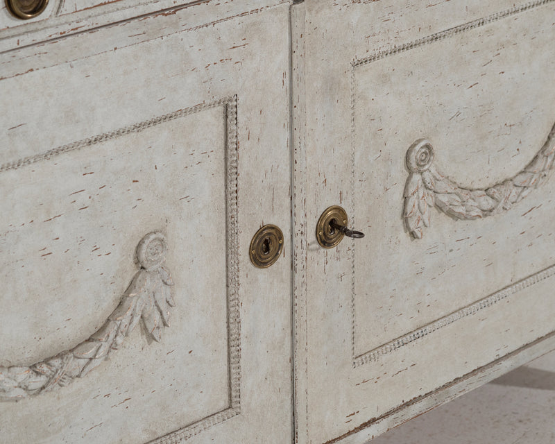 Gustavian sideboard with carvings, 19th C.