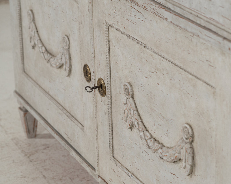 Gustavian sideboard with carvings, 19th C.